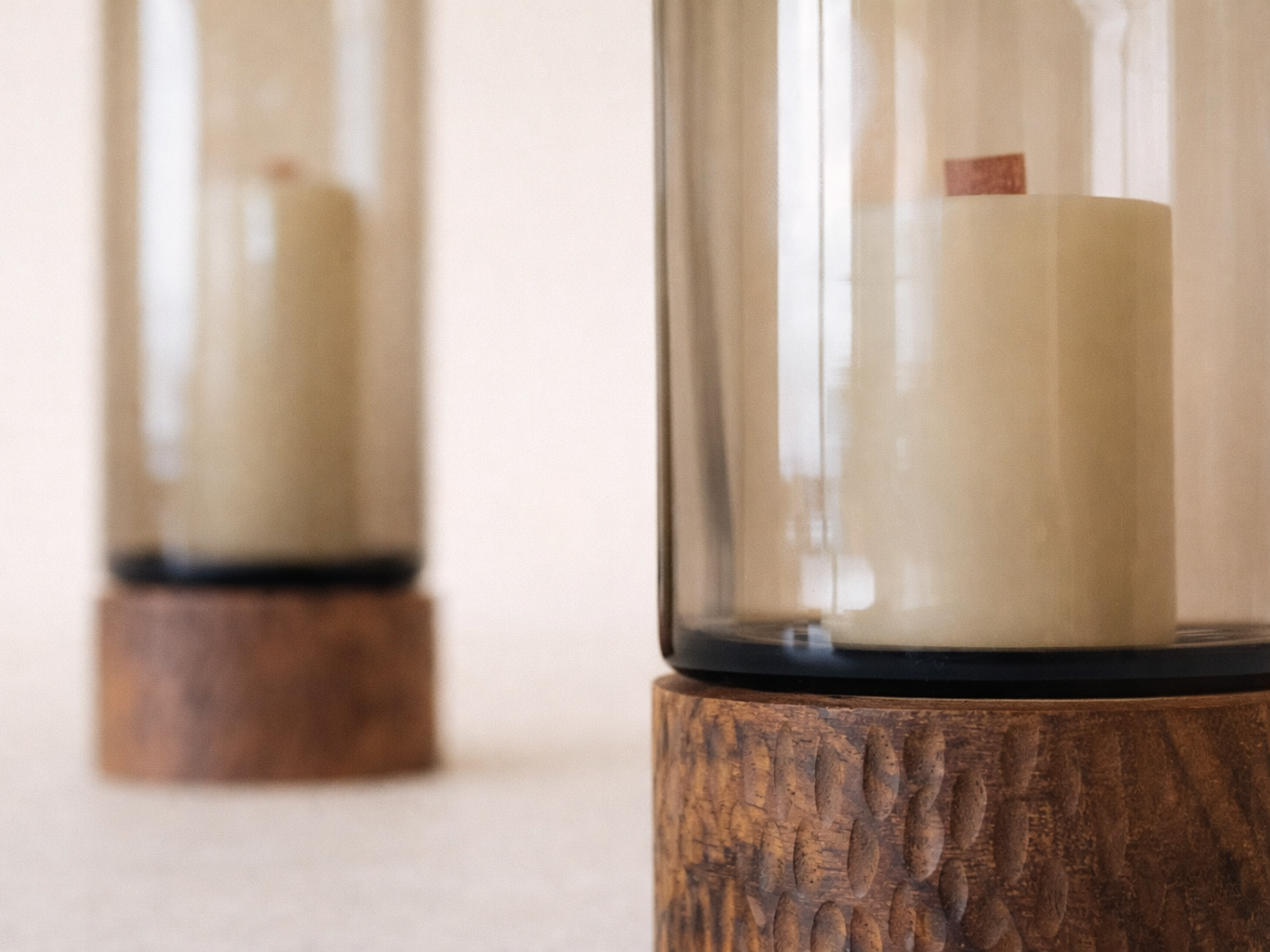 robusta candle base detail showing carved walnut surface