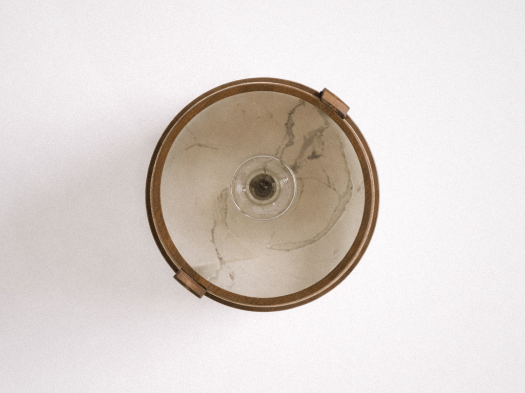 robusta table lamp top view revealing circular form and rattan structure